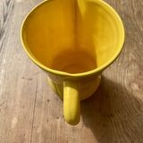 Vintage lemon yellow ceramic pitcher.