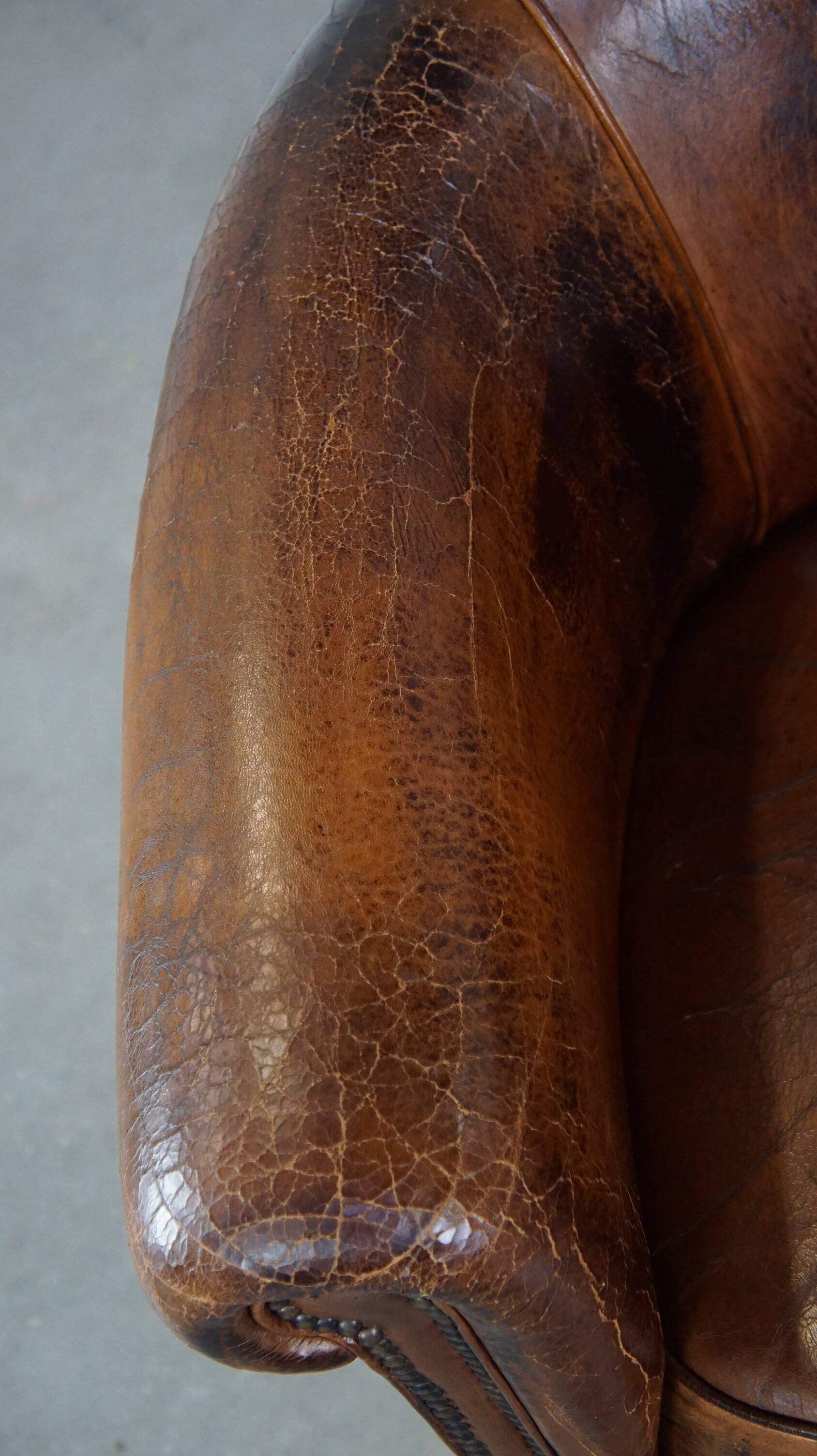 Sturdy, stately and subtle vintage sheepskin club chair