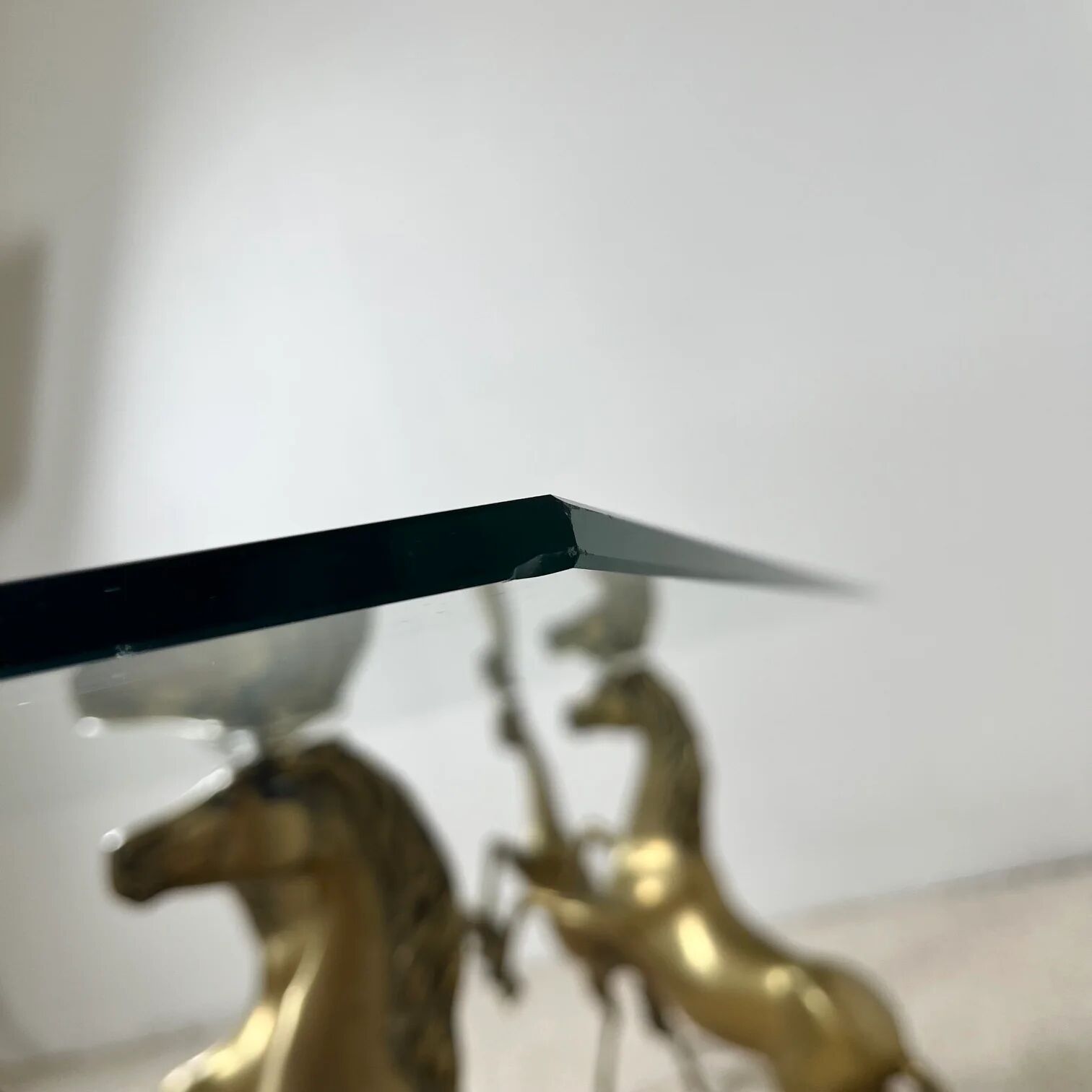 Hollywood Regency style coffee table, 6 patinated brass horses and glass top, 1970.