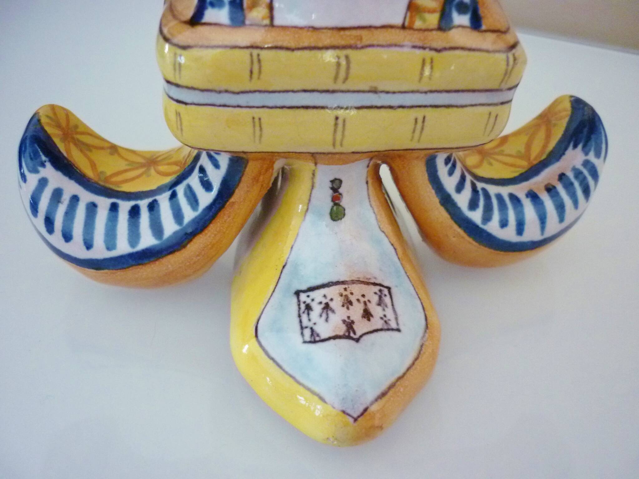Fleur-de-lis shaped vase, glazed ceramic, Brittany, Quimper, Breton ermines, character