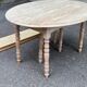 Renovated Louis Philippe round extendable dining table with flaps and 3 extensions.