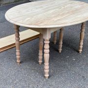 Renovated Louis Philippe round extendable dining table with flaps and 3 extensions.