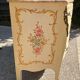 Curved Louis XV style commode in marble with painted floral decoration.