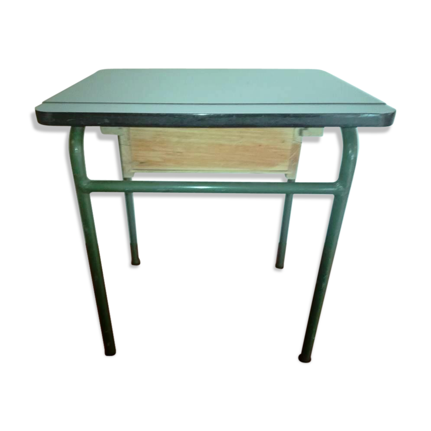 Child in formica desk