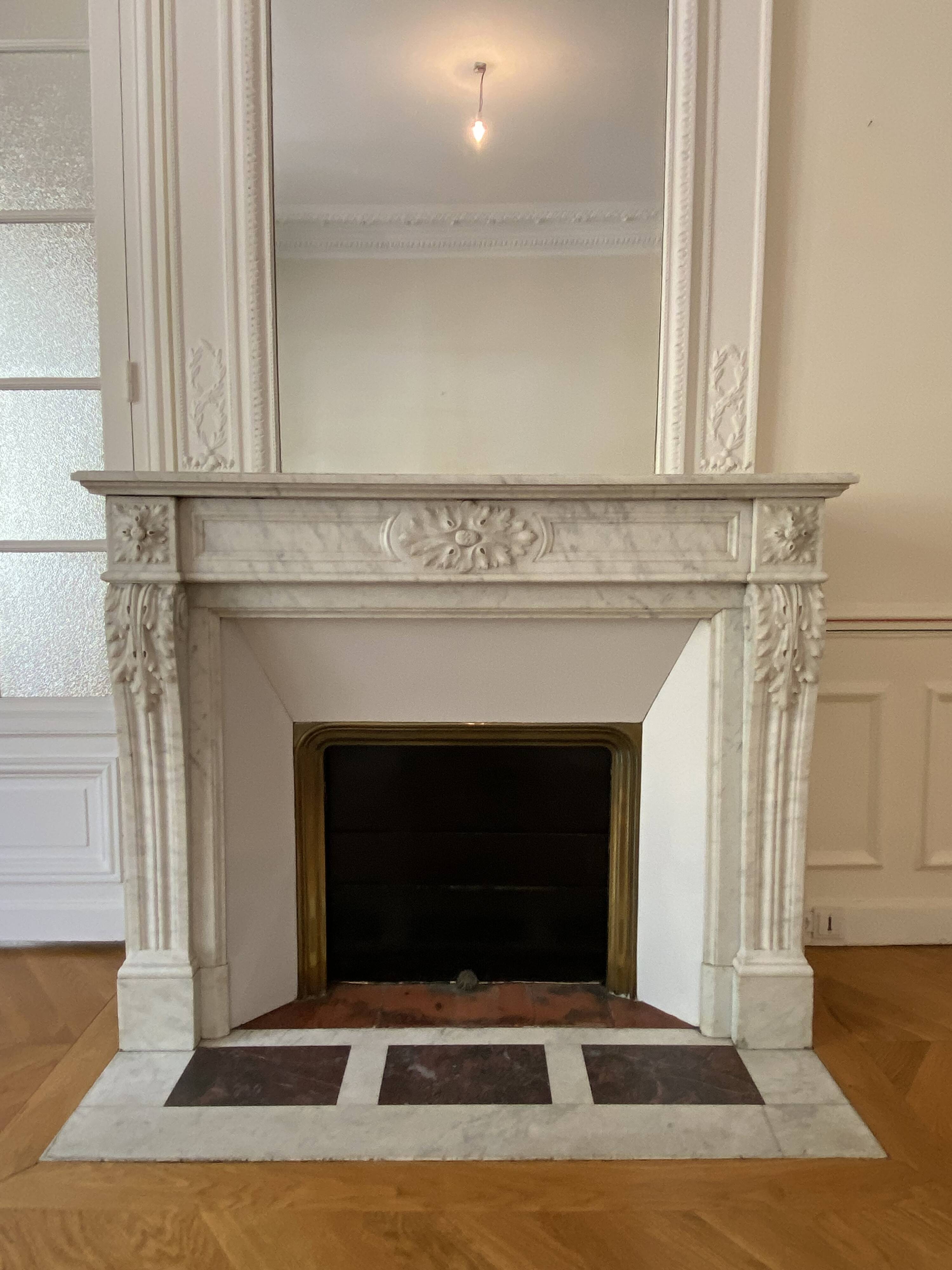 Antique marble fireplace with overmantel and mirror - Haussmannian apartment