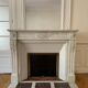 Antique marble fireplace with overmantel and mirror - Haussmannian apartment