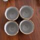 Set of 4 small stoneware tea bowls.