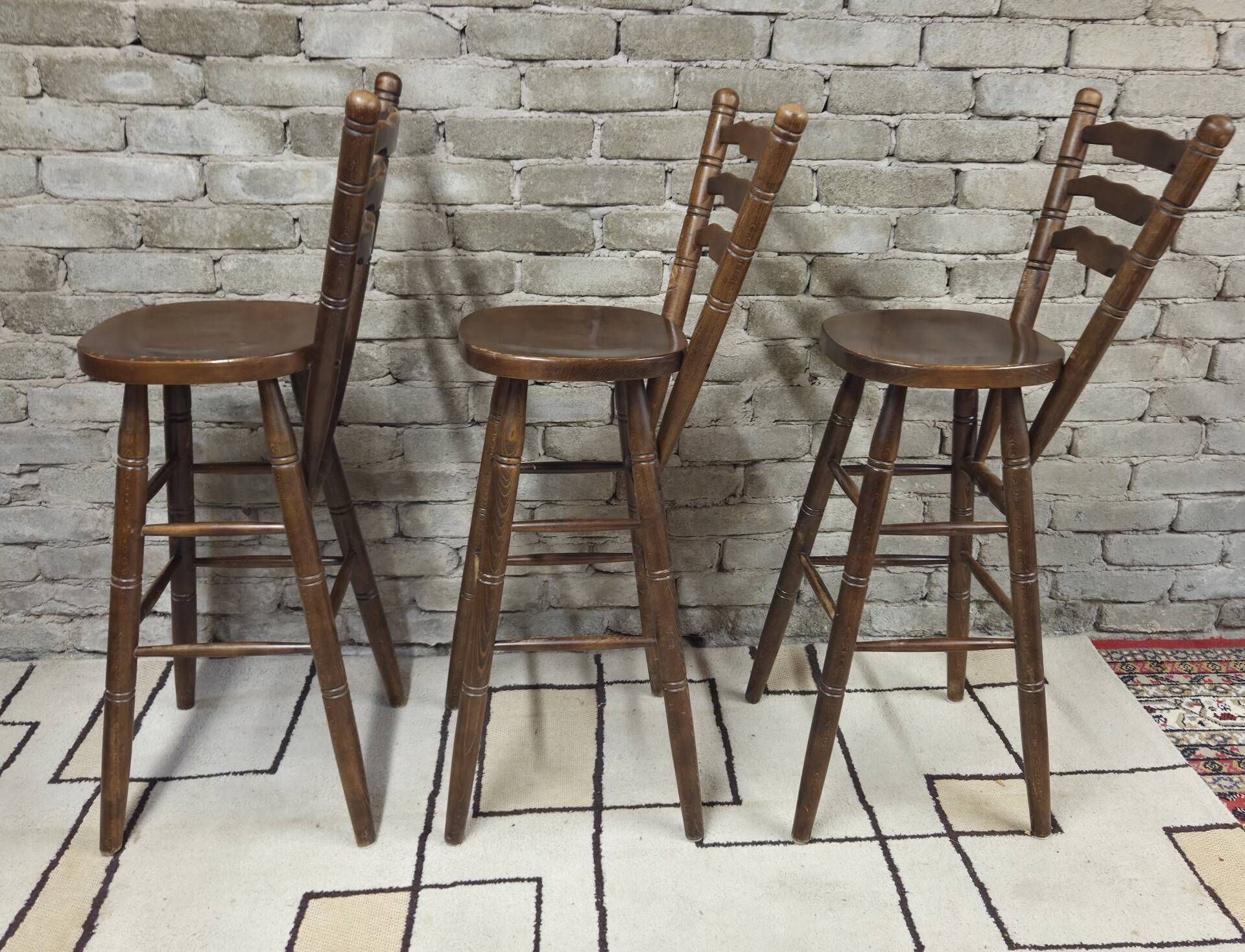3 vintage wooden bar stools from the 60s/70s with a bistro spirit.