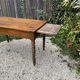 Old kitchen table with chopping board