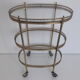 Serving table in brass