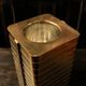 Italian gold-plated bottle cooler, architectural ribbed design.