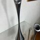 Pair of designer candle holders in stainless steel