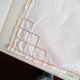 Antique linen tablecloth embroidered with flowers