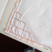 Antique linen tablecloth embroidered with flowers
