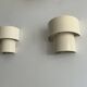 Pair of vintage modernist wall lights, white lacquered metal, Sweden 1970