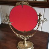 Oval mirror on psyche stand