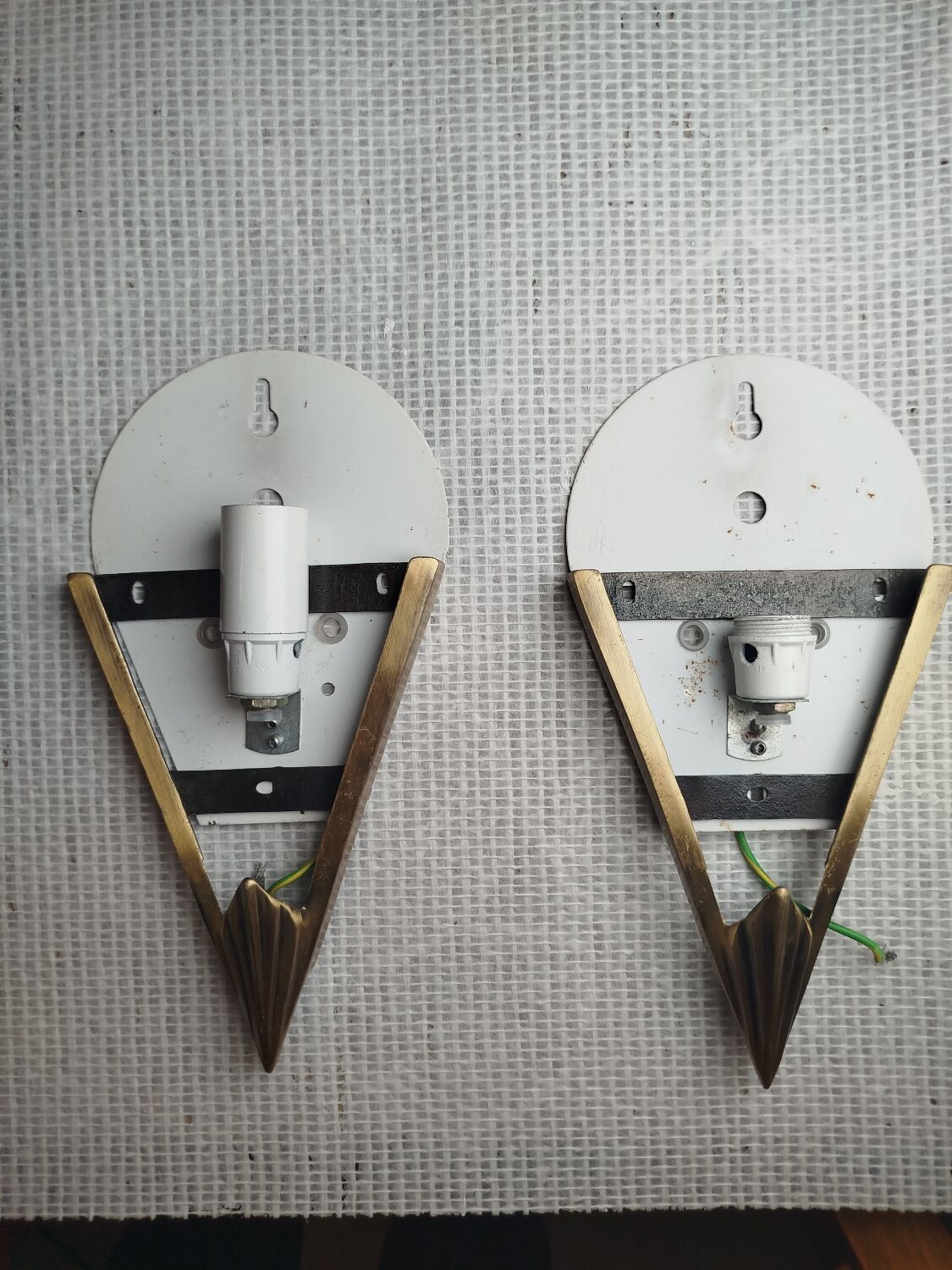 Pair of Art Deco wall sconces in frosted pressed glass.
