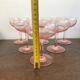 Champagne glass in pink glass with floral engraving