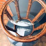 Round table in rattan and glass