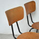 Série de 12 chaises en métal et bois