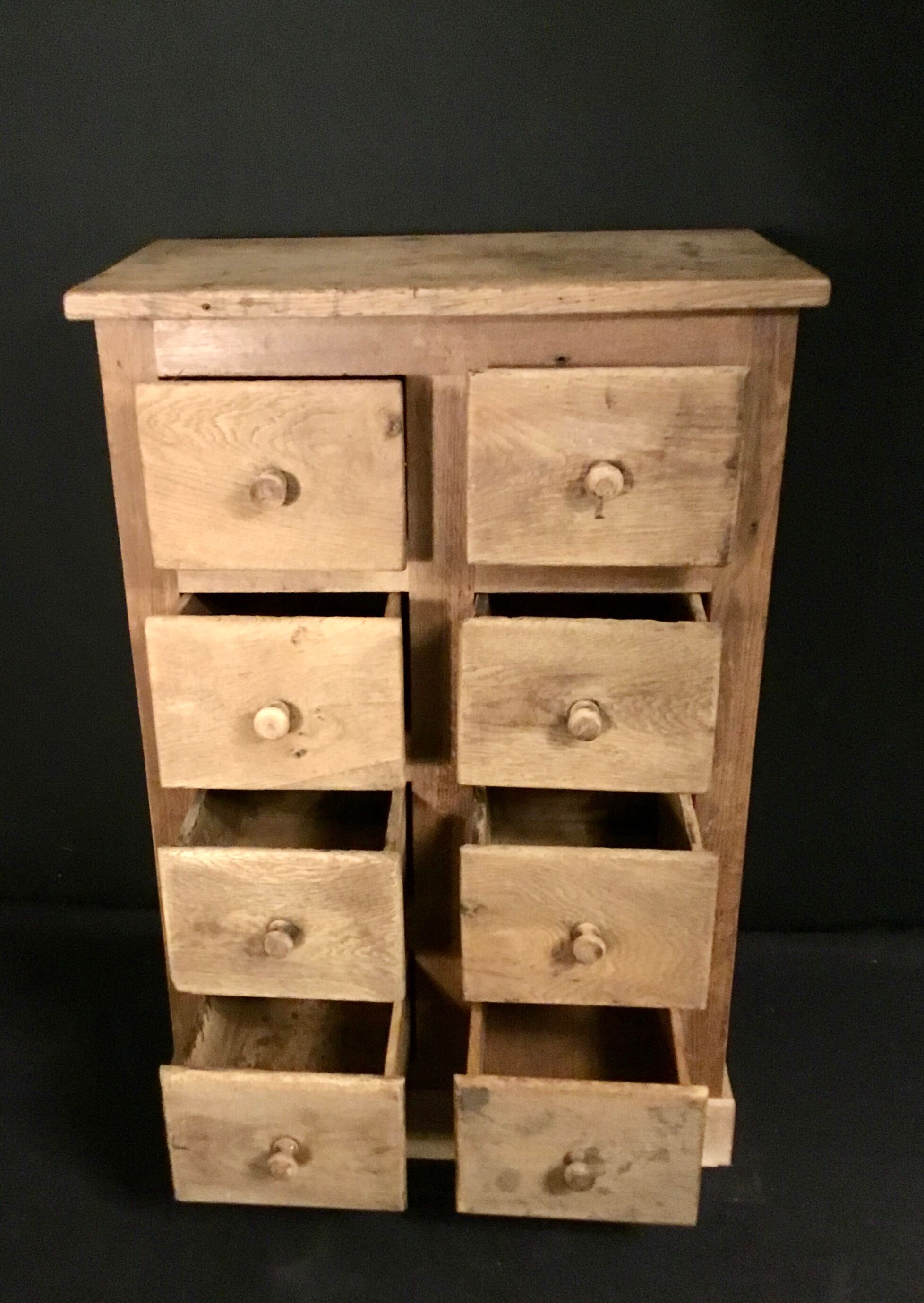 Furniture with 8 drawers in natural oak