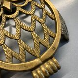 Old brass owl table mat