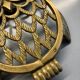 Old brass owl table mat