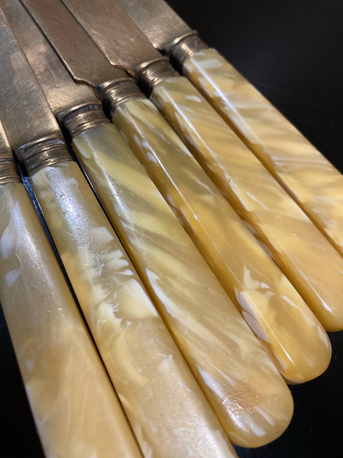 Yellow Bakelite dessert knives