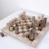 Modernist two-tone travertine chess set, Italy, 1970s