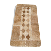 Tapis patchwork en peau de vache années 80