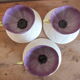 3 purple cups, porcelain flowers Geneviève Lethu