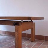 Large solid retractable coffee table