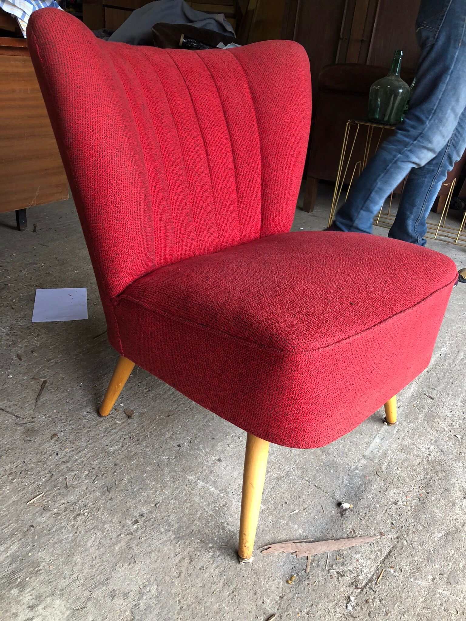 Vintage red cocktail armchair with compass feet