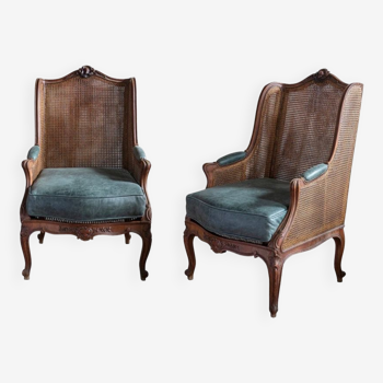 Pair of cane bergère armchairs