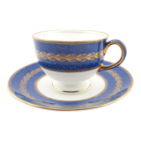 Antique Wedgwood teacup and saucer, bone china. Powder blue and gold English footed cup and saucer,