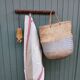Small antique wooden wall coat rack.