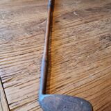 Wood, leather and metal golf club