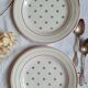 Old mismatched earthenware dessert plates