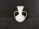 white and gold Clichy glass vase