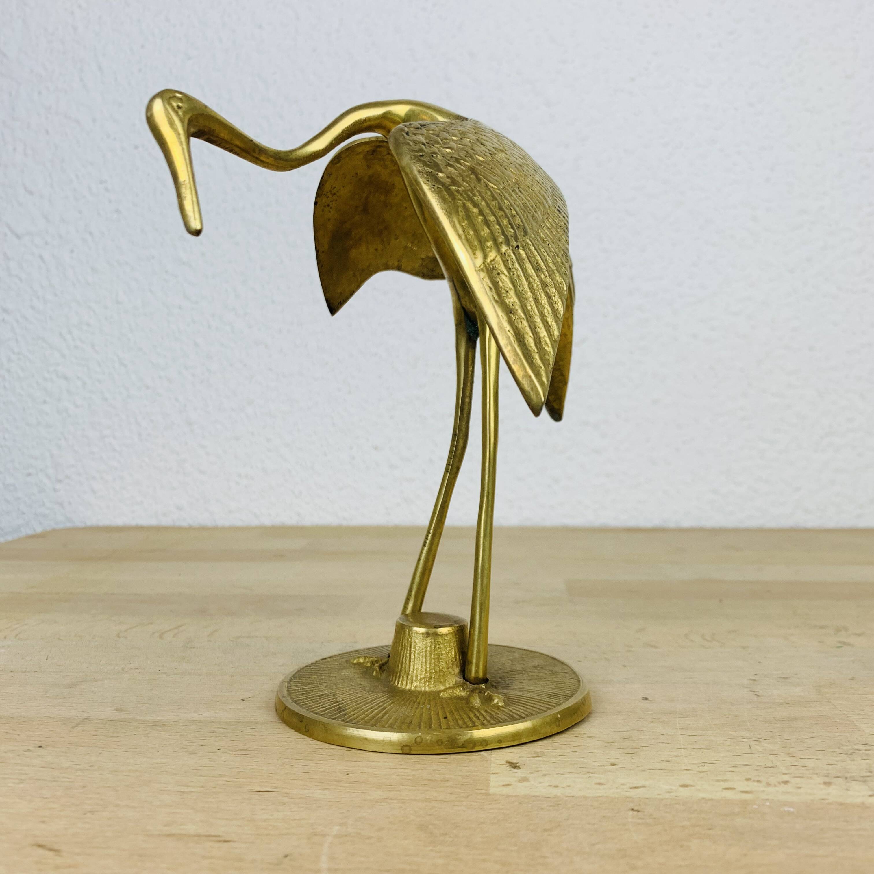 Vintage golden brass heron