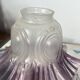 Antique tulip lampshade in transparent glass with a purple rim.