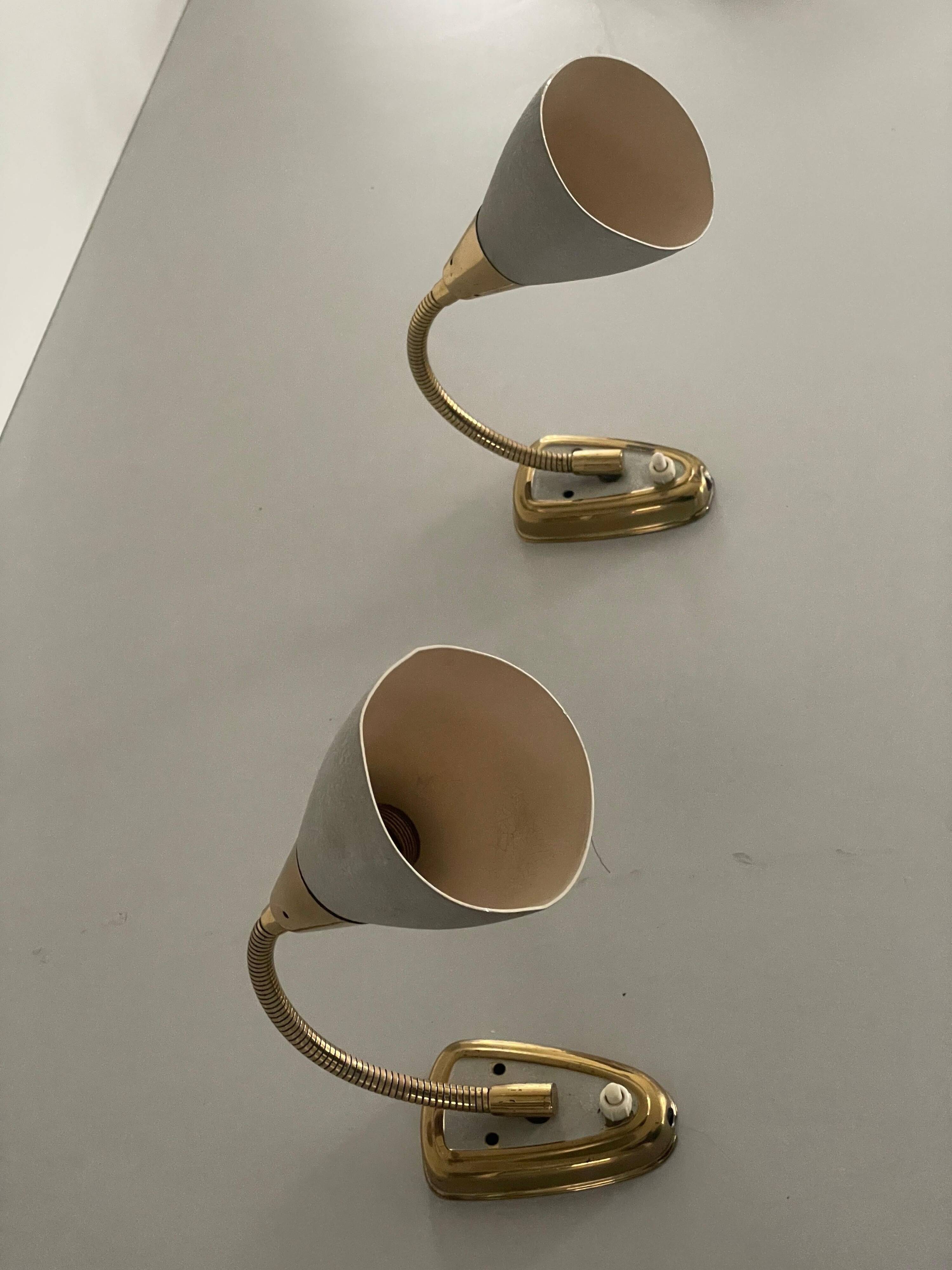 Pair of grey metal and brass wall lights, 1960s, Germany