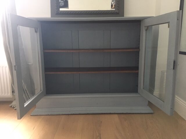 Vintage wooden cupboard and porcelain lock