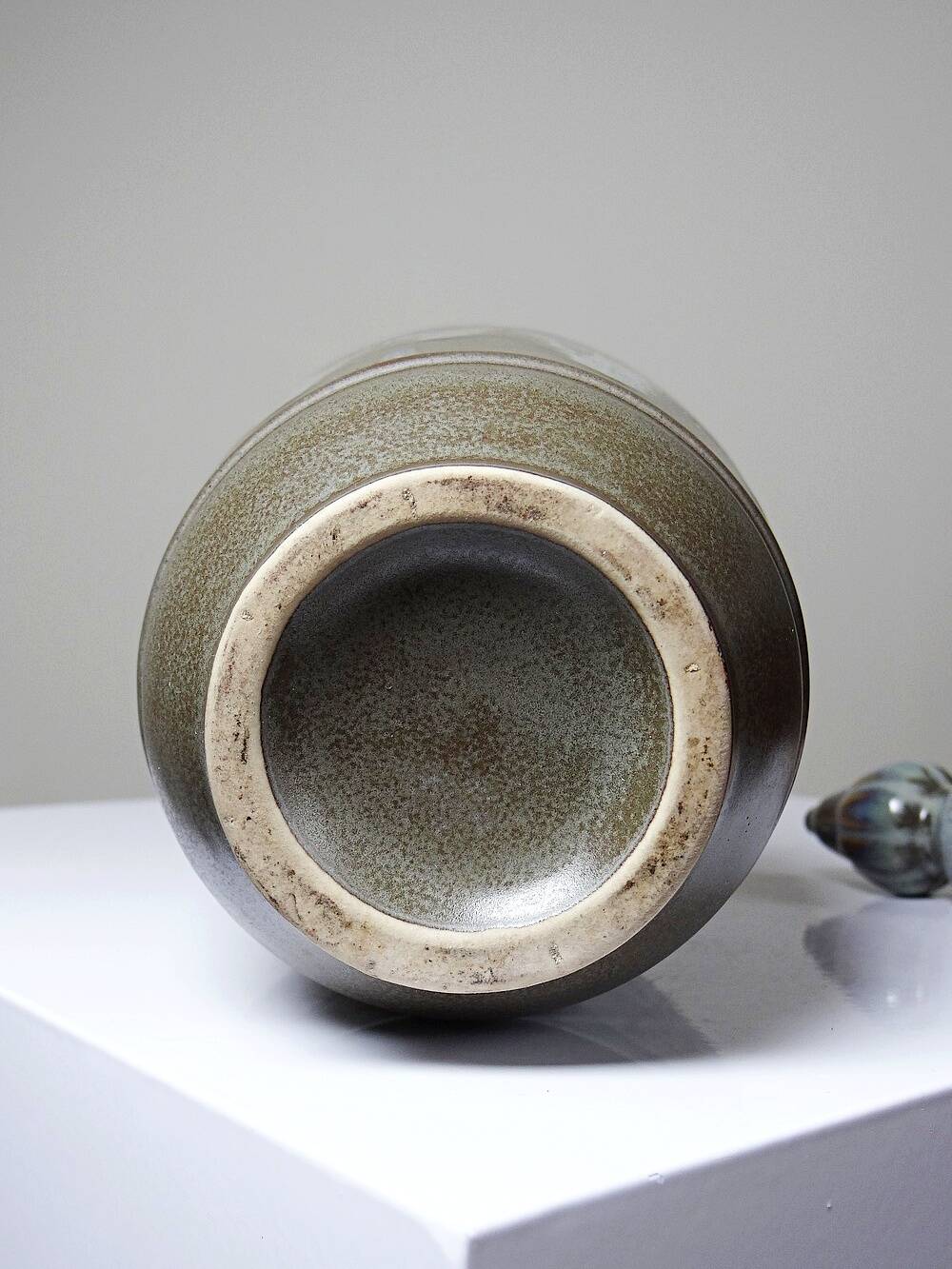 Vintage stoneware bottle with flamed glaze, France 1950-1970.