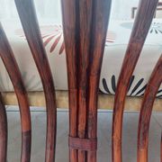 Vintage salon Maison Maugrion in rattan with leather and feather finishes.