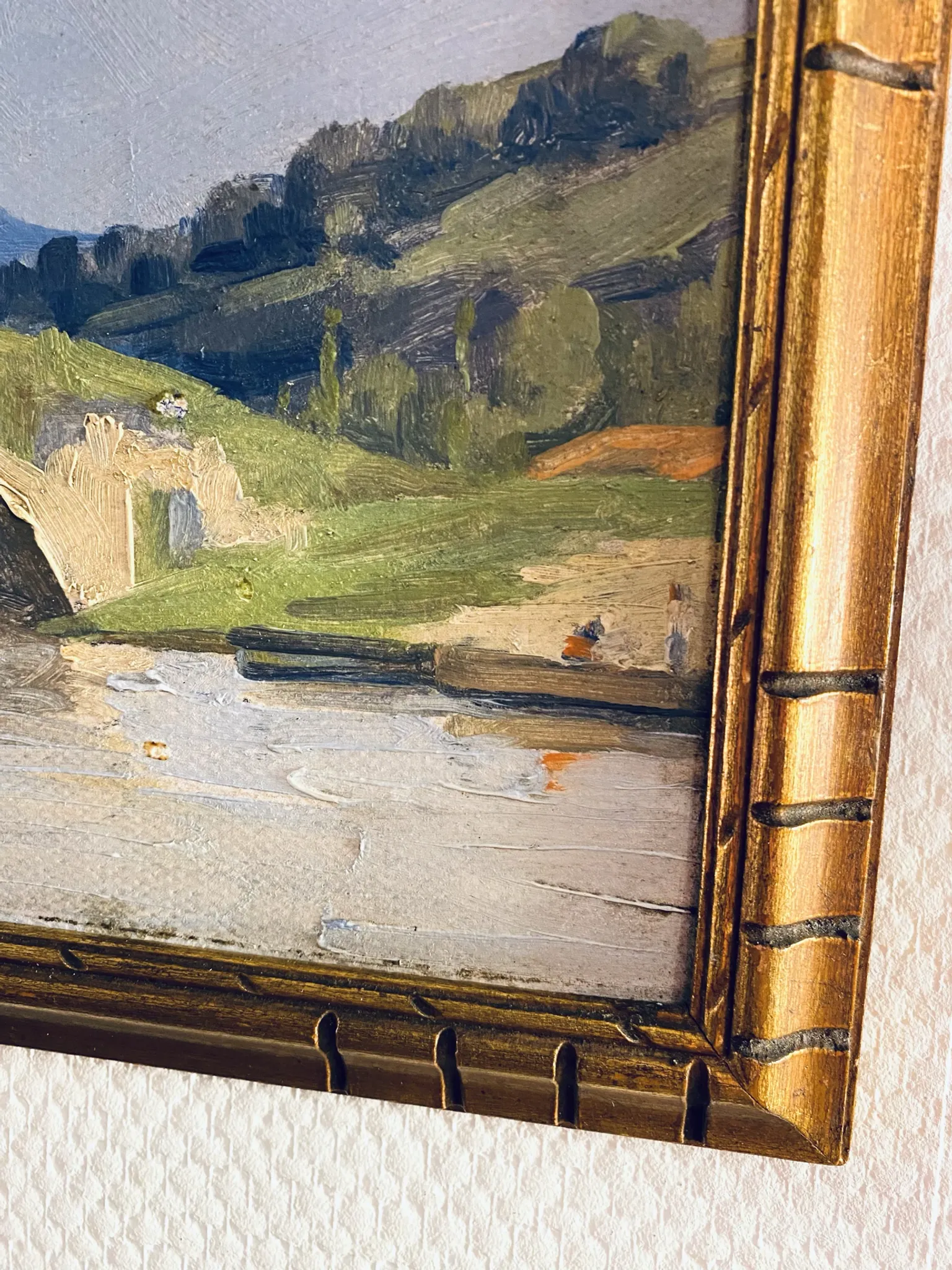 Small oil on panel of a countryside view from the early 20th century.