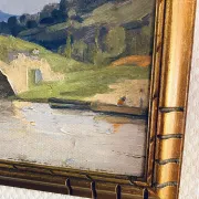 Small oil on panel of a countryside view from the early 20th century.