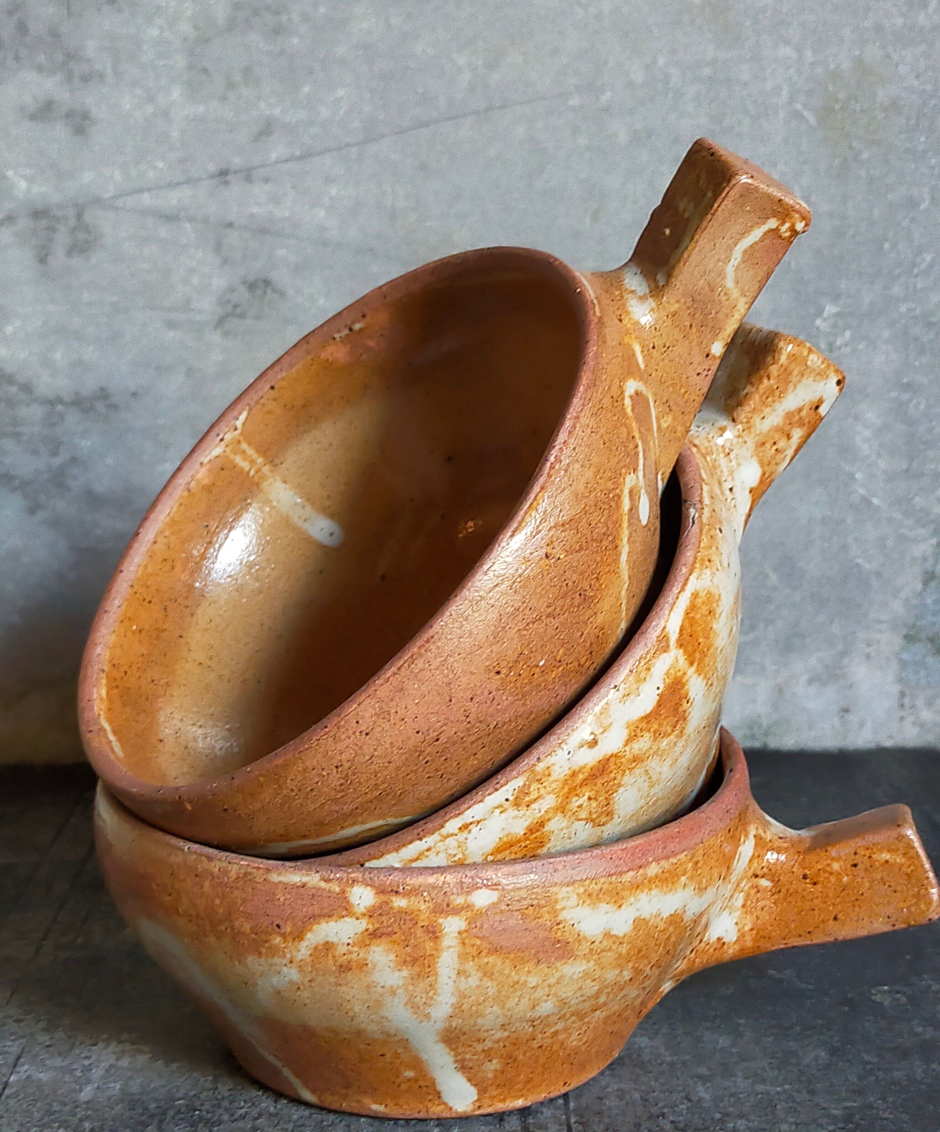 Three vintage marais sandstone bowls