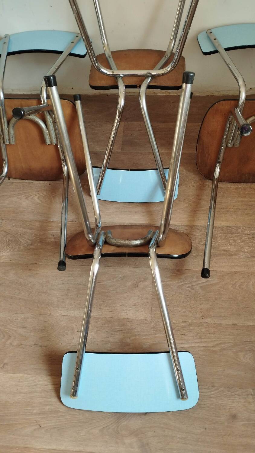 4 blue Formica chairs