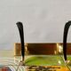 Vintage wall-mounted coat rack in golden aluminum - triple coat hook